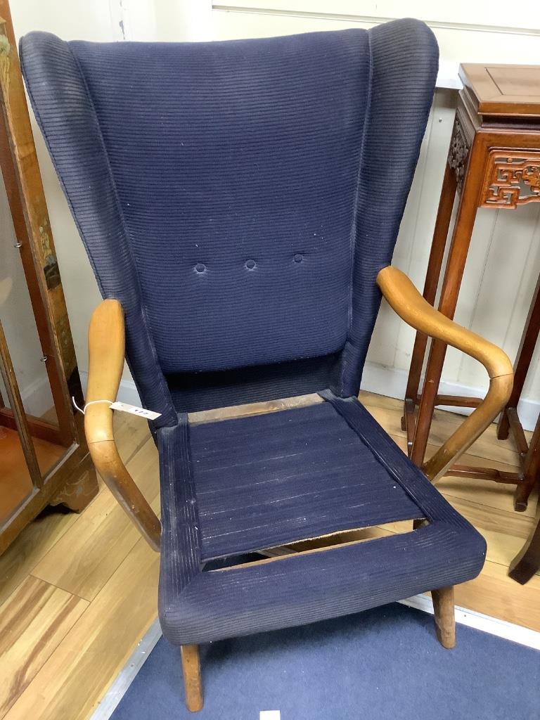 A Howard Keith Bambino armchair, (lacks seat pad) width 66cm, height 92cm